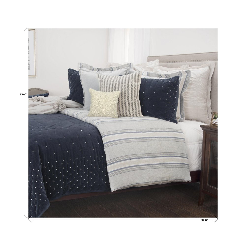 Indigo Polka Dots Queen Quilt on a white background