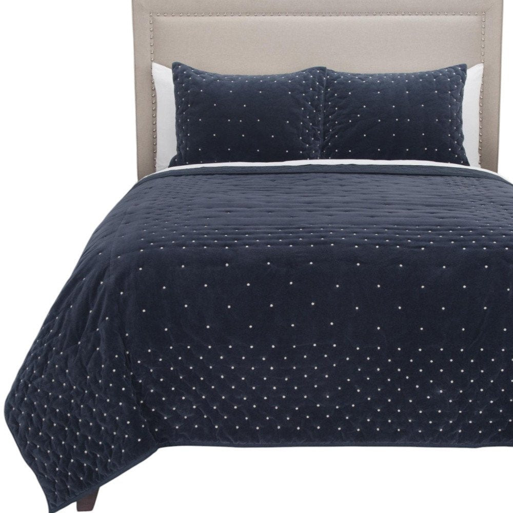 Indigo Polka Dots Queen Quilt on a white background