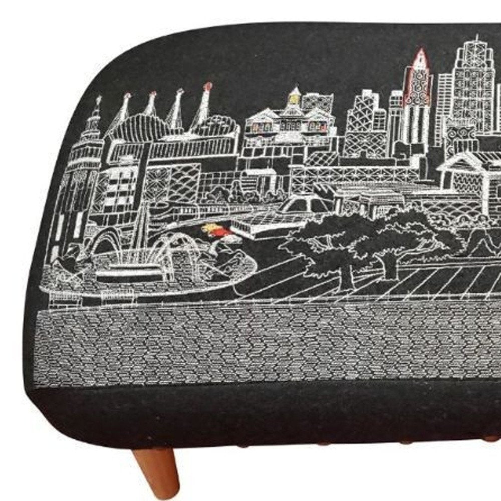 38" Black Wool and Brown Ottoman. Ottoman isolated on a plain white background, in a black wool finish.