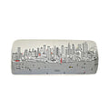 Cream wool ottoman with a black and white sketch of a city skyline and boats on water.