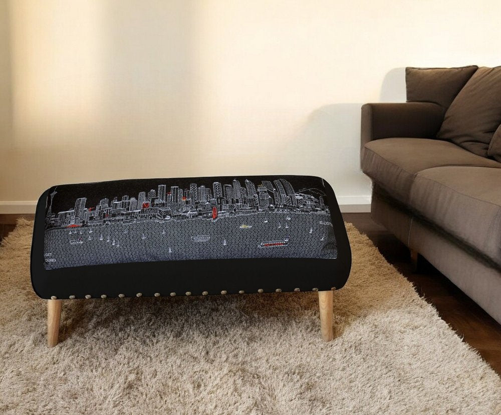 38" Gray Wool and Brown Ottoman - SKU 480551 styled in a furnished interior with an off-white wall on a wood floor.