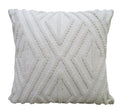 White tufted diamond pattern throw pillow on a white background.