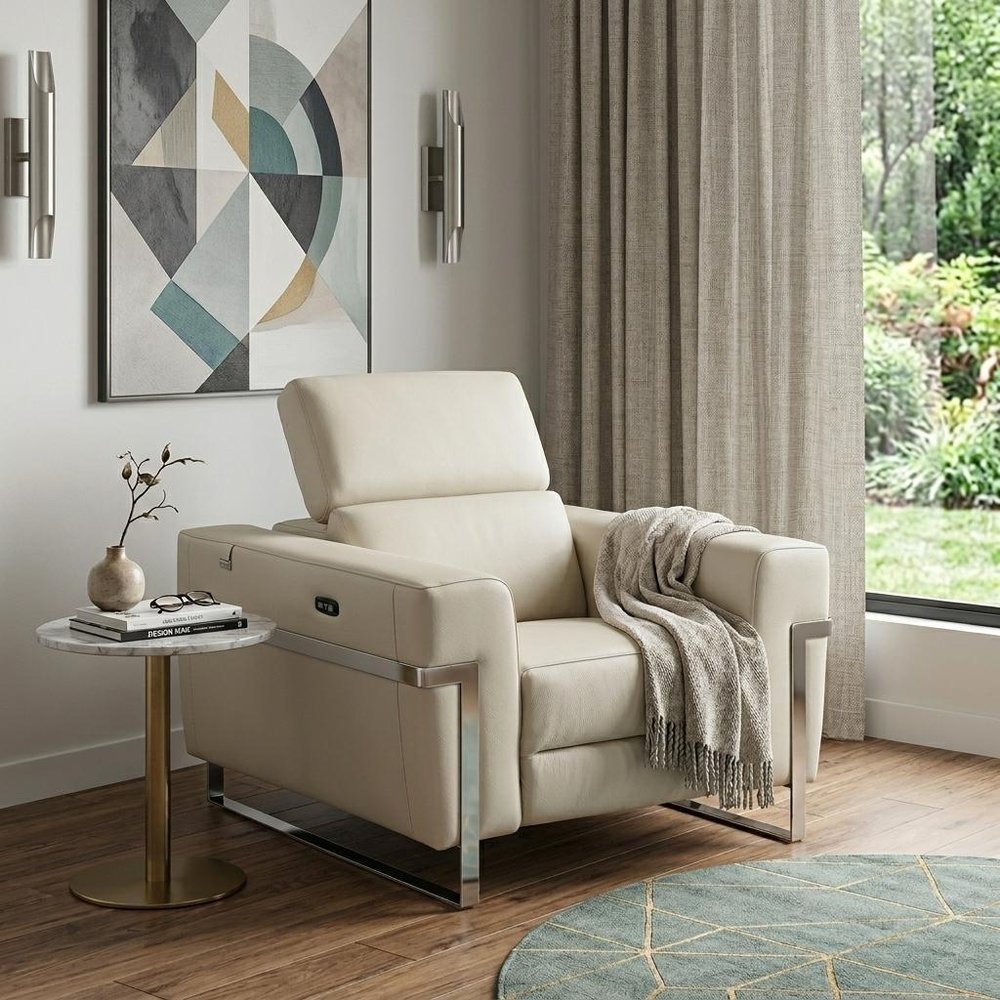 41" White Italian Leather Power Recliner Chair styled in a furnished interior with a light gray wall on a dark wood floor.