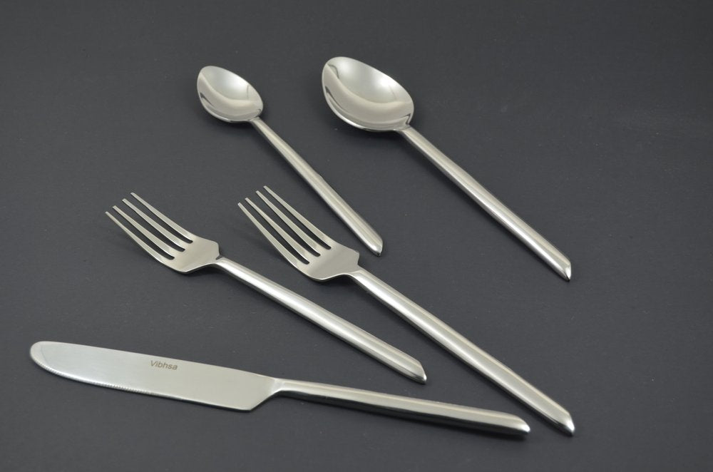 Glossy Silver Stainless Steel Twenty Piece Hand Forged Flatware Set close-up detail