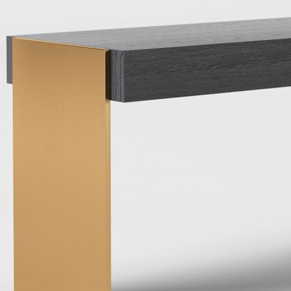 63" Gray and Gold Writing Desk With Four Drawers. Desk in gold.