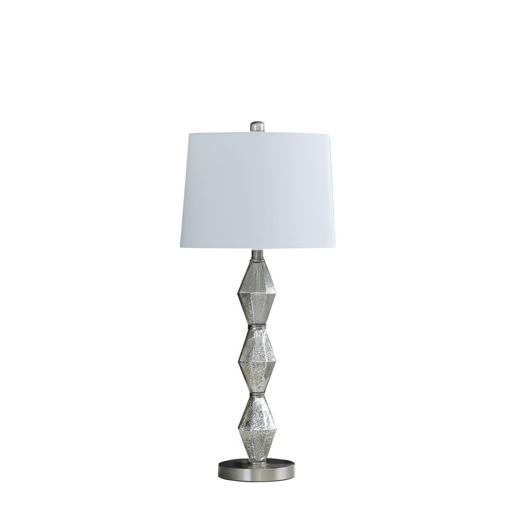 30" Brushed Silver Geo Glass Table Lamp With White Shade. Table lamp isolated on a plain white background, finished in silver glass.