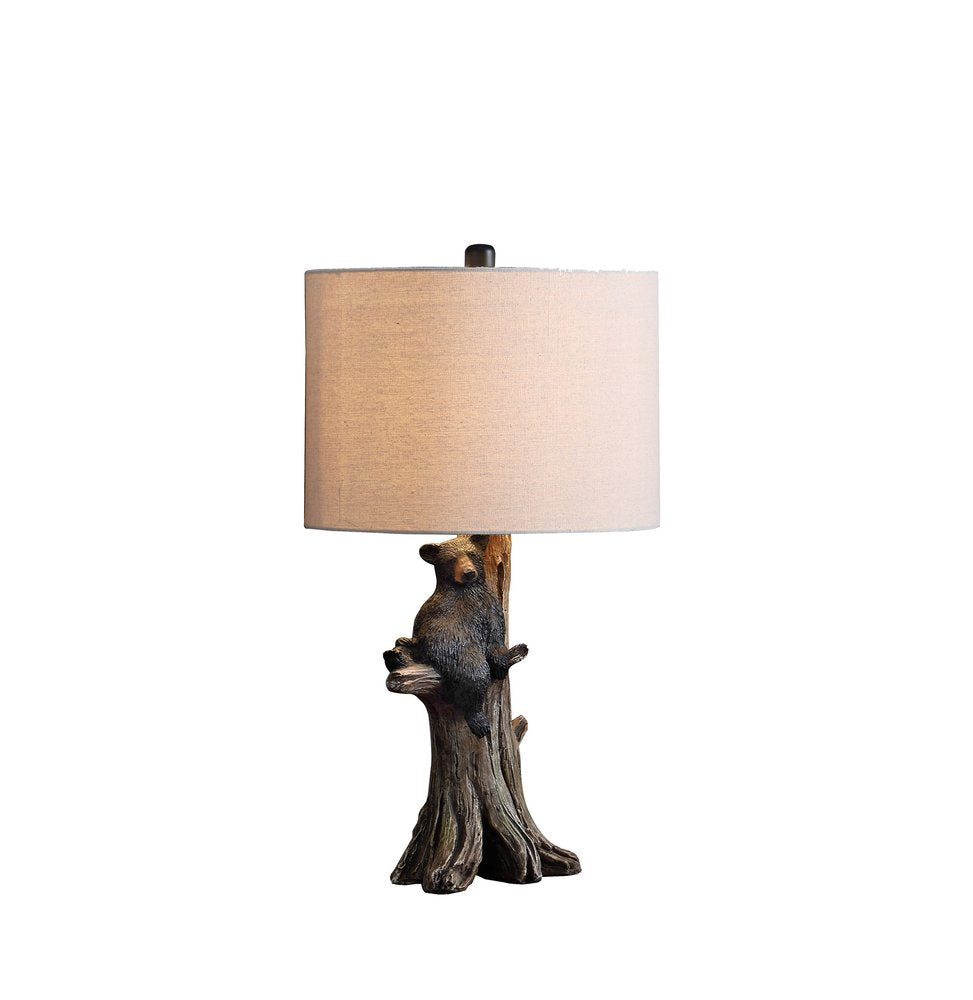 25" Black Bear in a Tree Table Lamp With Beige Shade. Table lamp isolated on a plain white background, finished in beige.