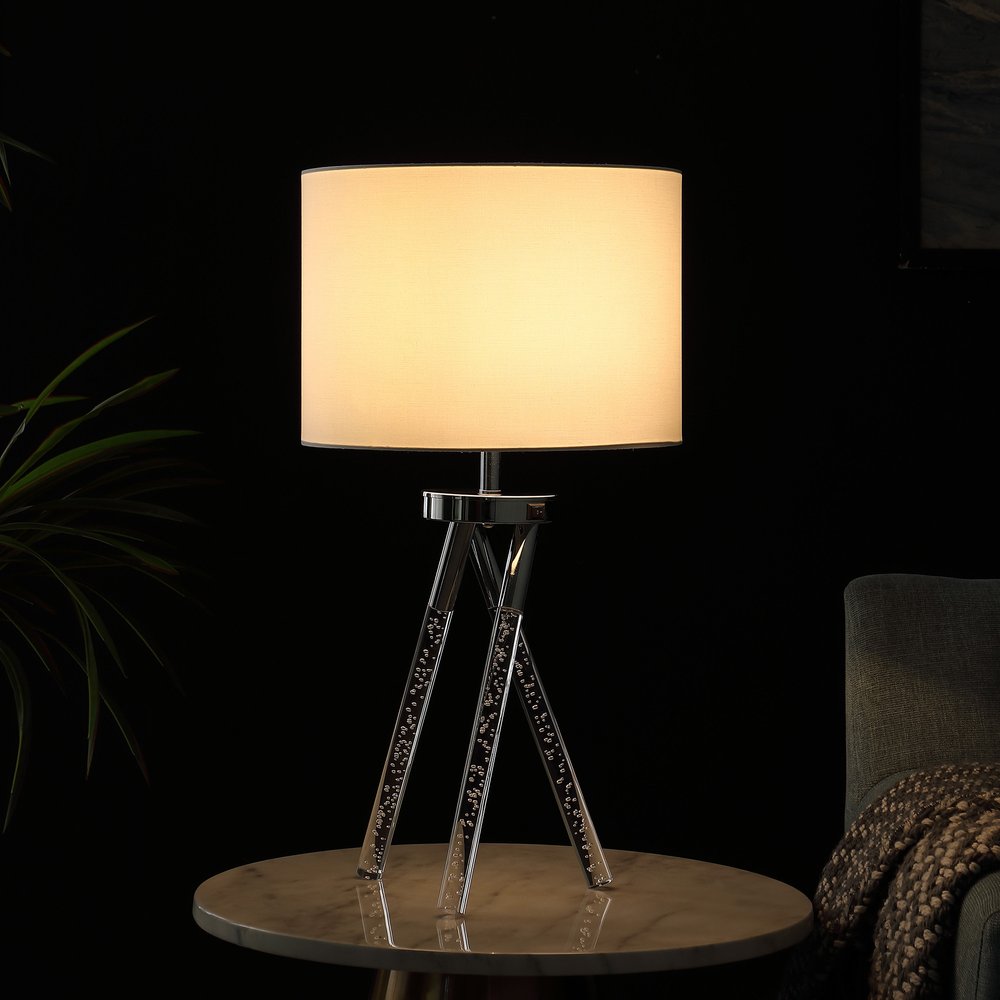 26" Silver and LED Acrylic Tripod Table Lamp With White Shade photographed against a dark studio background.