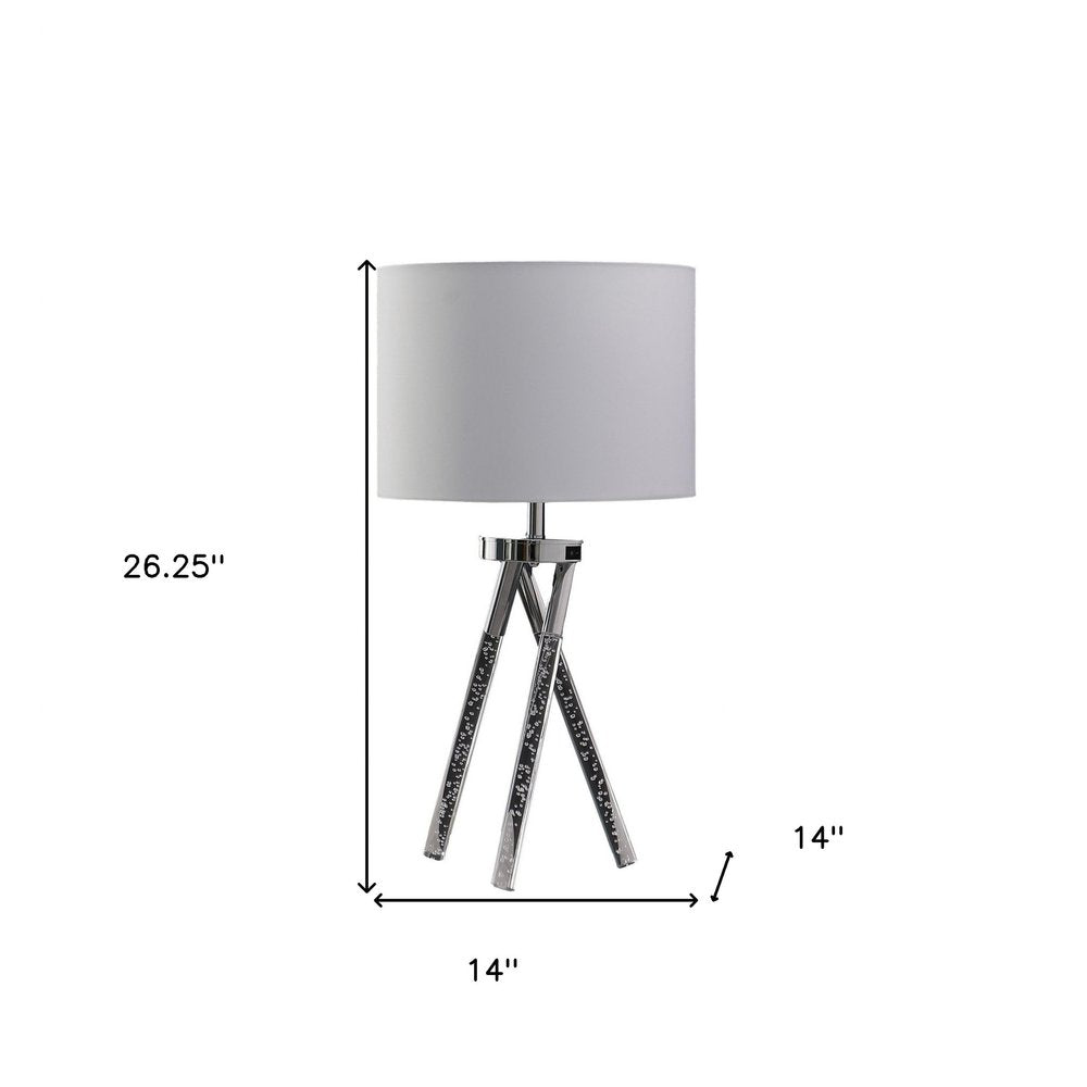 26" Silver and LED Acrylic Tripod Table Lamp With White Shade. Table lamp isolated on a plain white background, showing its silver color.