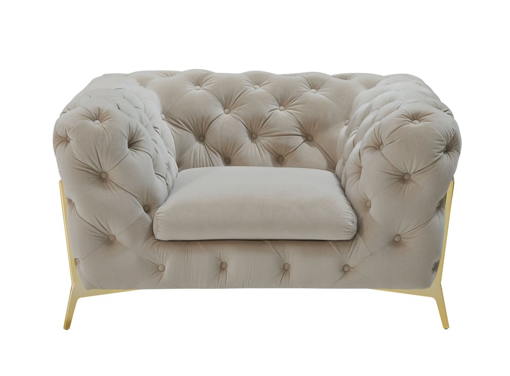 Beige velvet tufted lounge chair with gold metal legs on a white background.