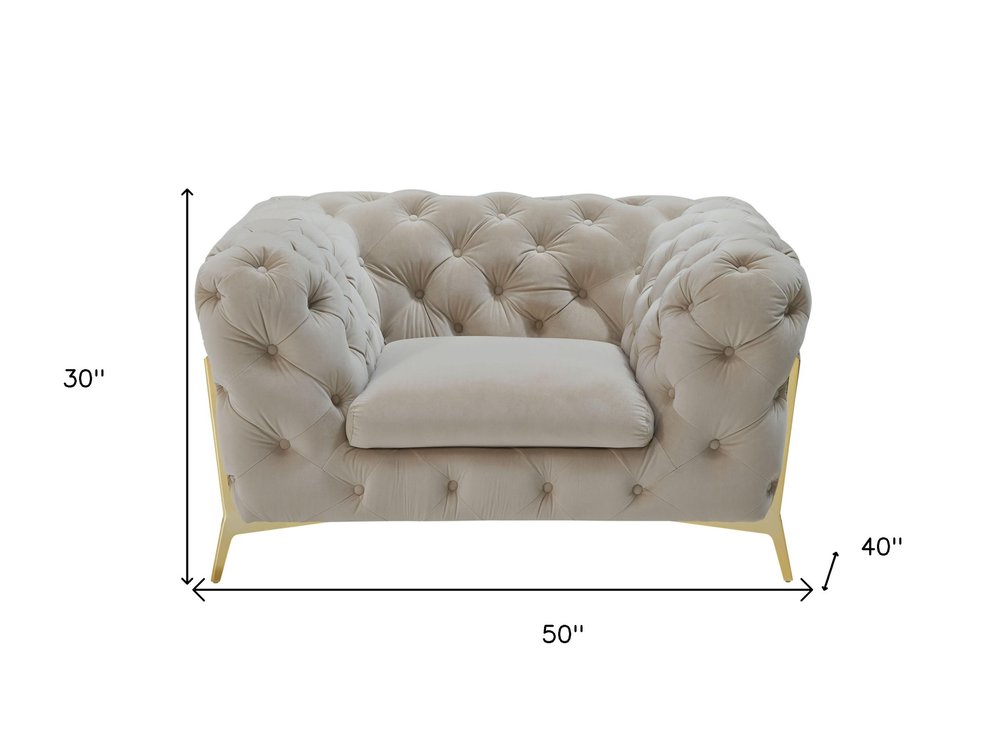 50" Beige And Gold Velvet Tufted Lounge Chair. Accent chair isolated on a plain white background, showing a beige velvet surface.