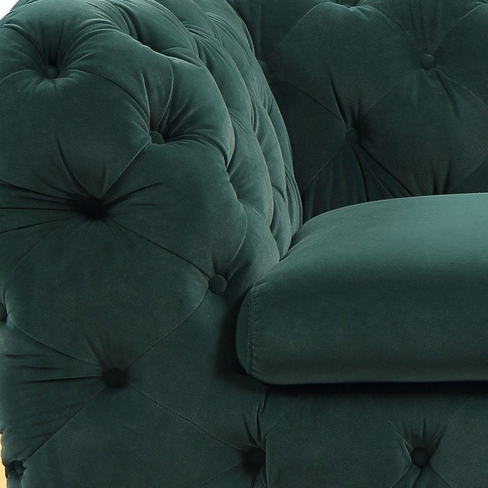 Close-up of 50" Green And Gold Velvet Tufted Club Chair showing the green velvet texture.