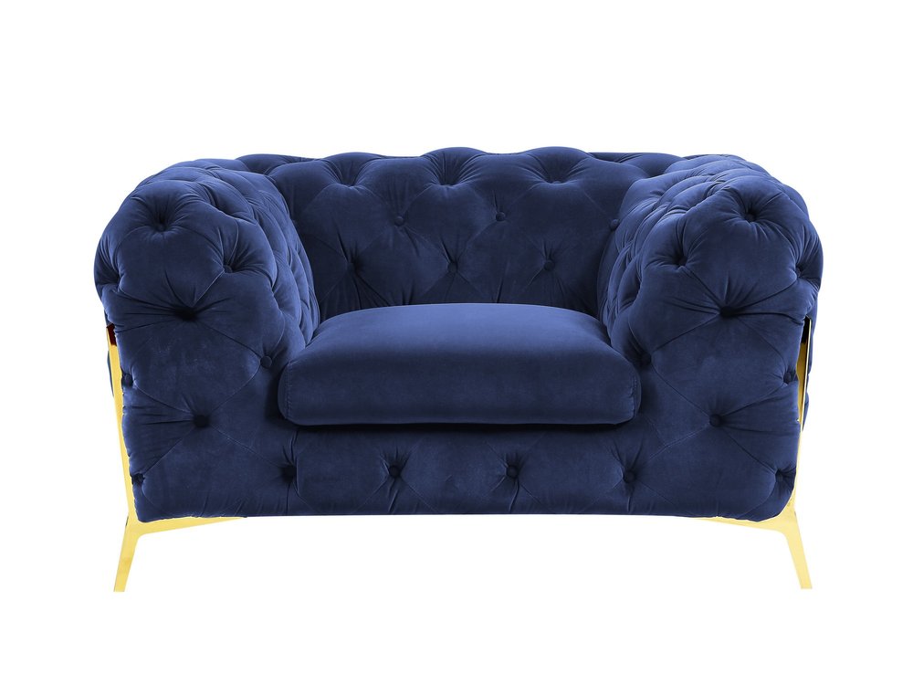 Blue velvet tufted lounge chair with gold legs on a white background.