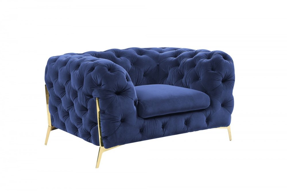 50" Blue And Gold Velvet Tufted Lounge Chair. Accent chair isolated on a plain white background, showing a blue velvet surface.