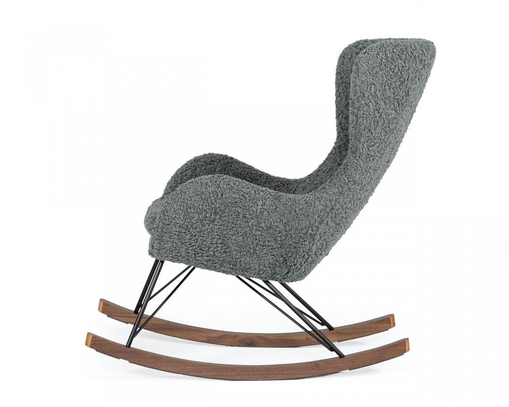 30" Gray and Brown Faux Fur Metal And Solid Wood Rocking Chair. Rocking chair isolated on a plain white background, showing a gray wood surface.