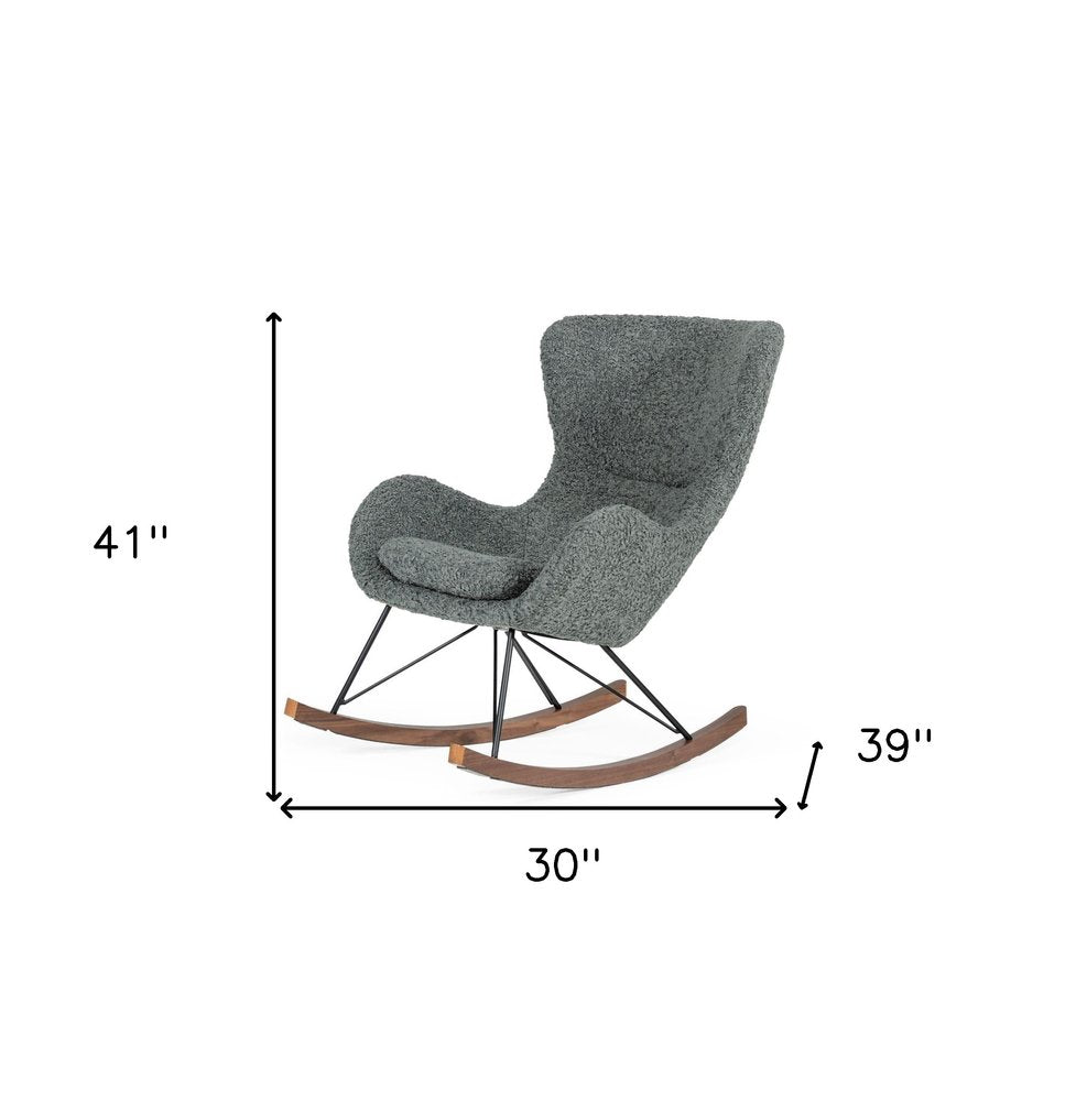 30" Gray and Brown Faux Fur Metal And Solid Wood Rocking Chair. Rocking chair isolated on a plain white background, showing a gray wood surface.