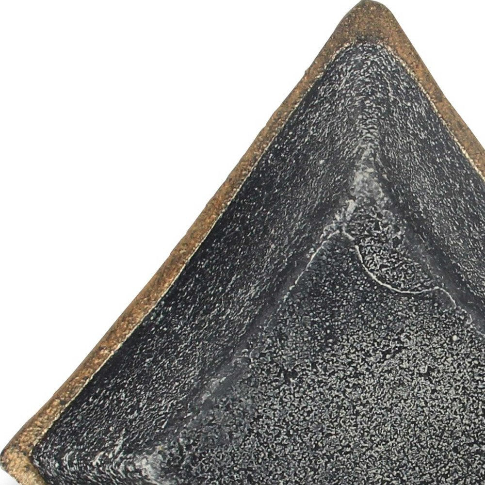 5" Black Cast Iron Diamond Square Bowl. Serving bowl isolated on a plain white background, showing a black metal surface.