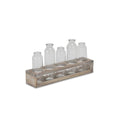 Set of Five Clear Cylinder Glass Decorative Bottles on a white background