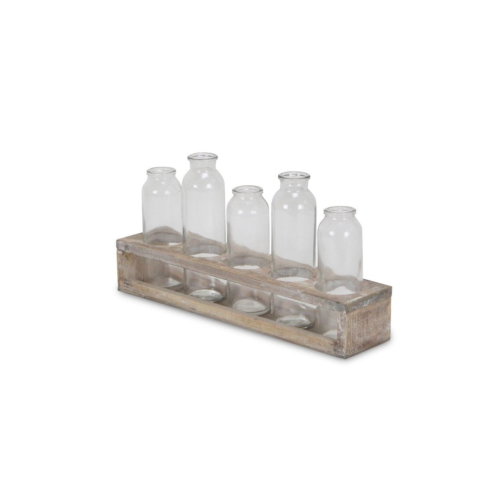 Set of Five Clear Cylinder Glass Decorative Bottles on a white background