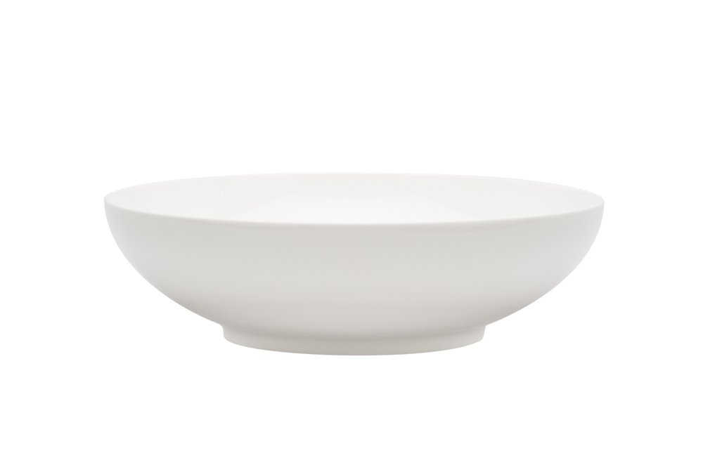 White porcelain serving bowl on a white background.