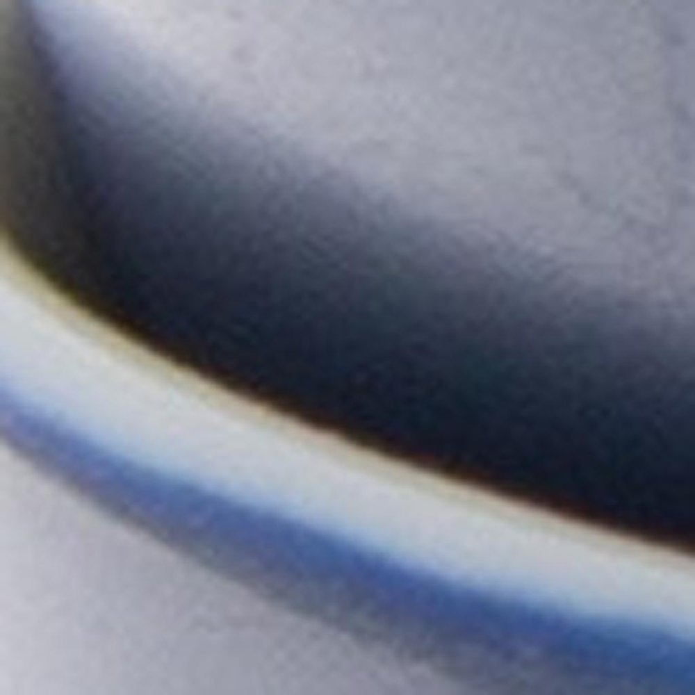 Blue and White Four Piece Porcelain Service For Four Bowl Set in a home interior