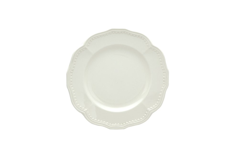 White scallop stoneware salad plate with beaded rim on a white background.