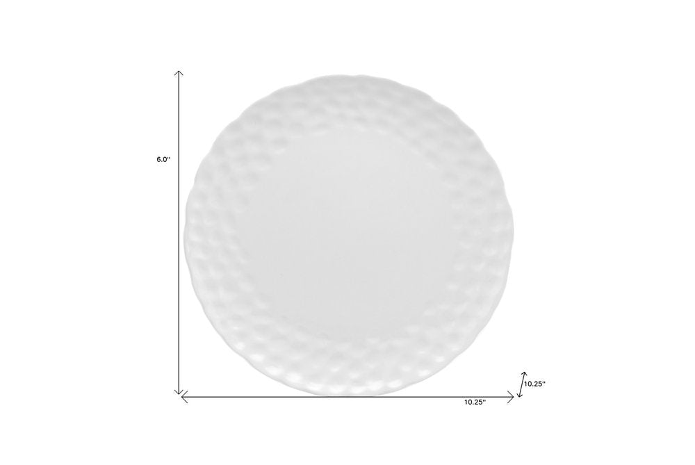 White Six Piece Round Pebbled Porcelain Service For Six Dinner Plate Set on a white background