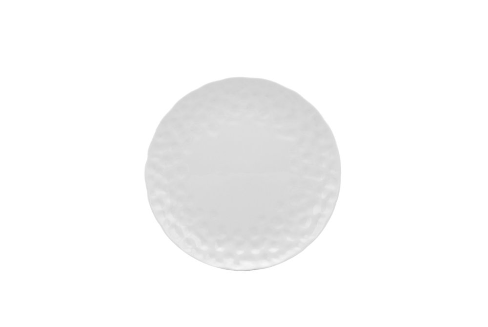 White round porcelain salad plate with a pebbled texture on a white background.