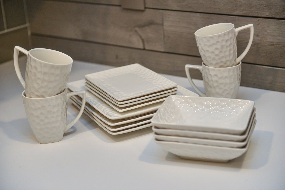 White Six Piece Rectangle Pebbled Porcelain Service For Six Salad Plate Set in a home interior