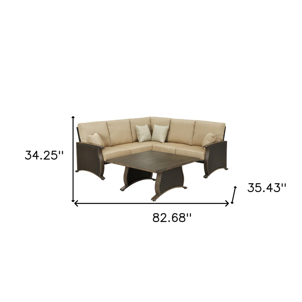 Two Piece Brown and Tan Metal Sectional Seating Group With Table on a white background