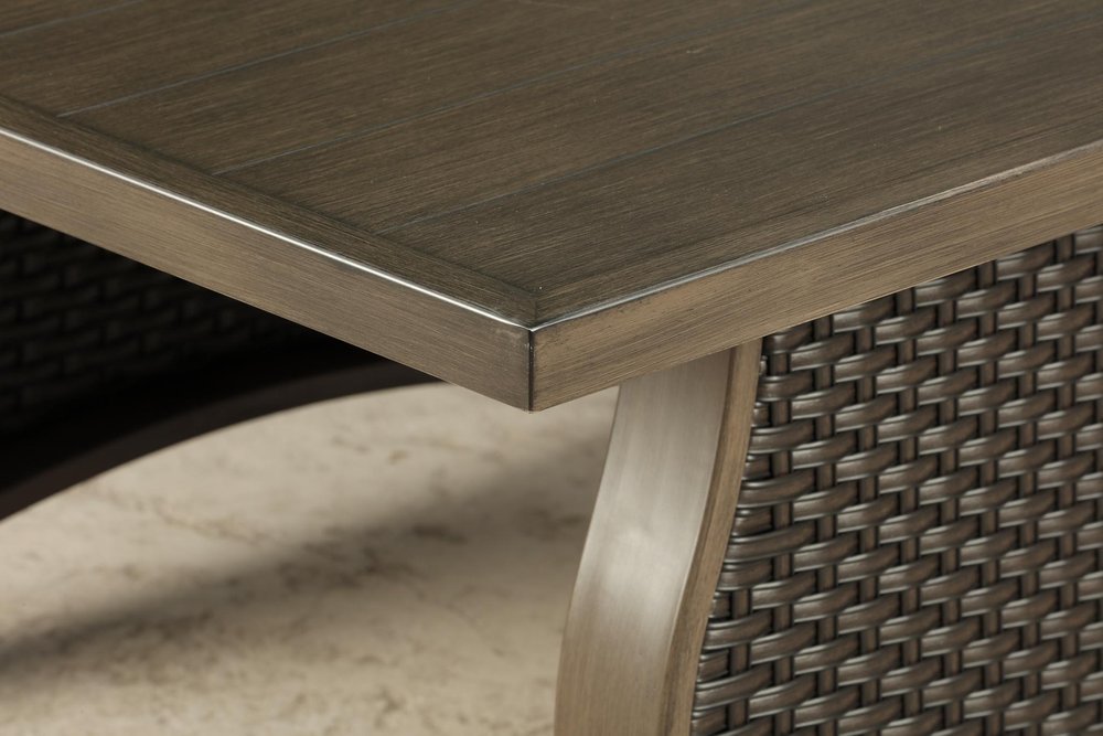 Two Piece Brown and Tan Metal Sectional Seating Group With Table close-up detail