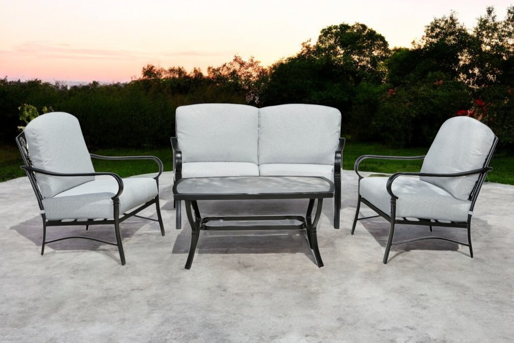 Four Piece Black and Light Gray Metal Outdoor Patio Set With Table