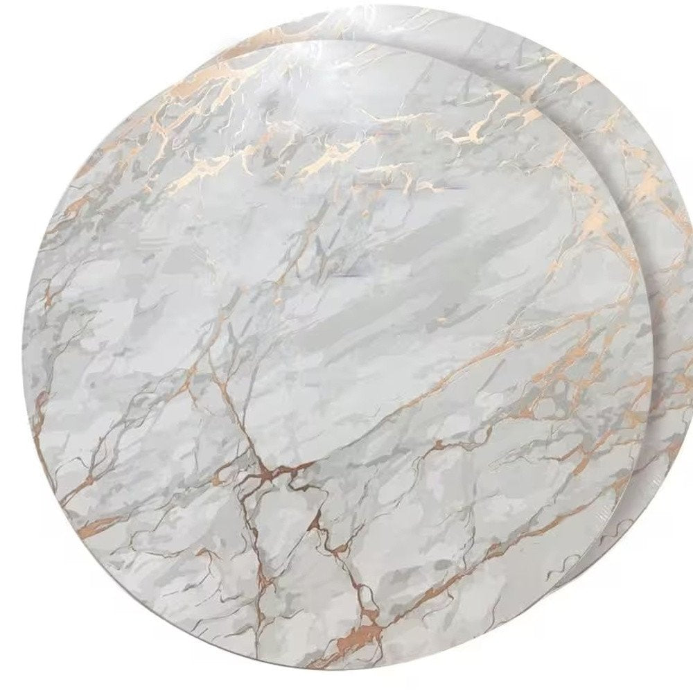 15" X 15" Gold Ivory And Gray Abstract Agglomerated cork Round Placemats. Dining linen isolated on a plain white background, showing a ivory linen surface.