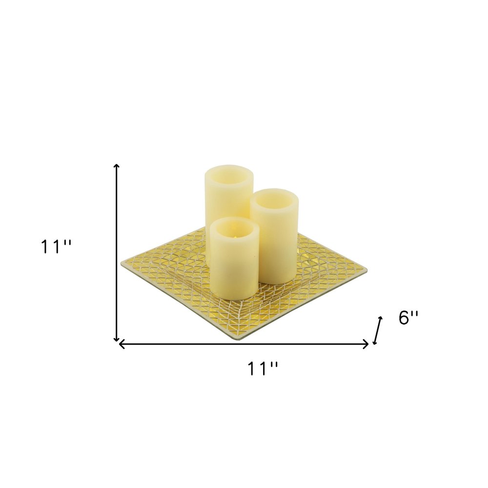 Set of Three Ivory Flameless Pillar Candles With Gold Holder on a white background