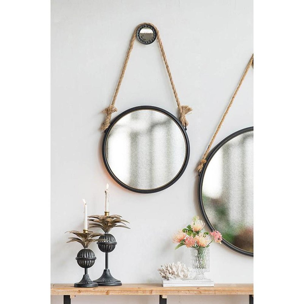 Black and Silver Round Accent Metal Mirror on a white background