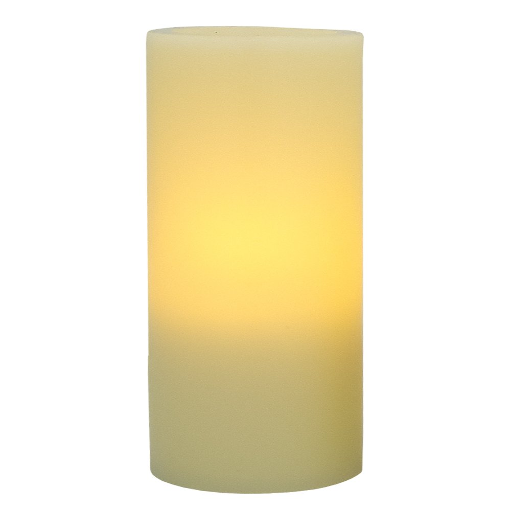 An ivory flameless pillar candle with a warm glow against a white background.