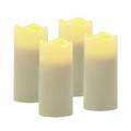 Set of Four Ivory Flameless Votive Candle on a white background
