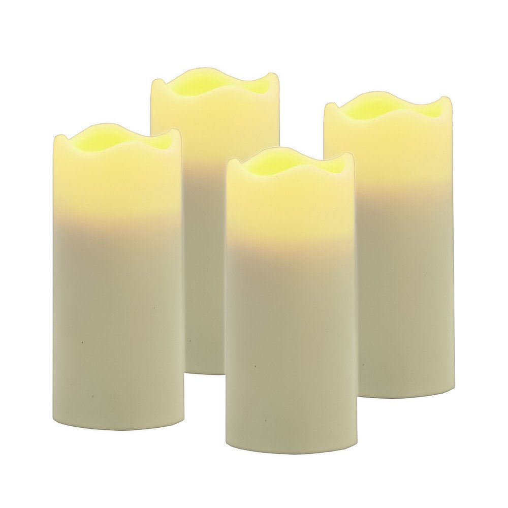 Set of Four Ivory Flameless Votive Candle on a white background