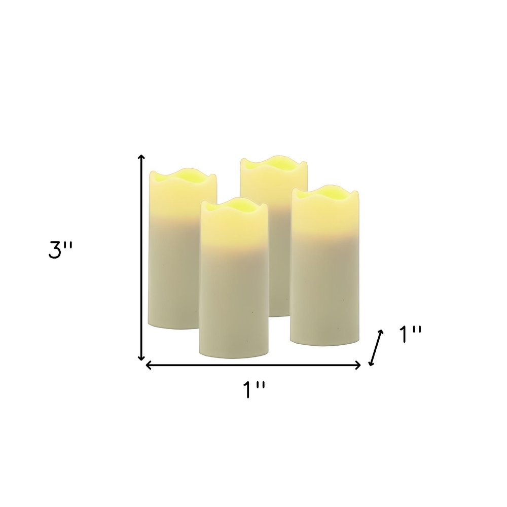 Set of Four Ivory Flameless Votive Candle on a white background