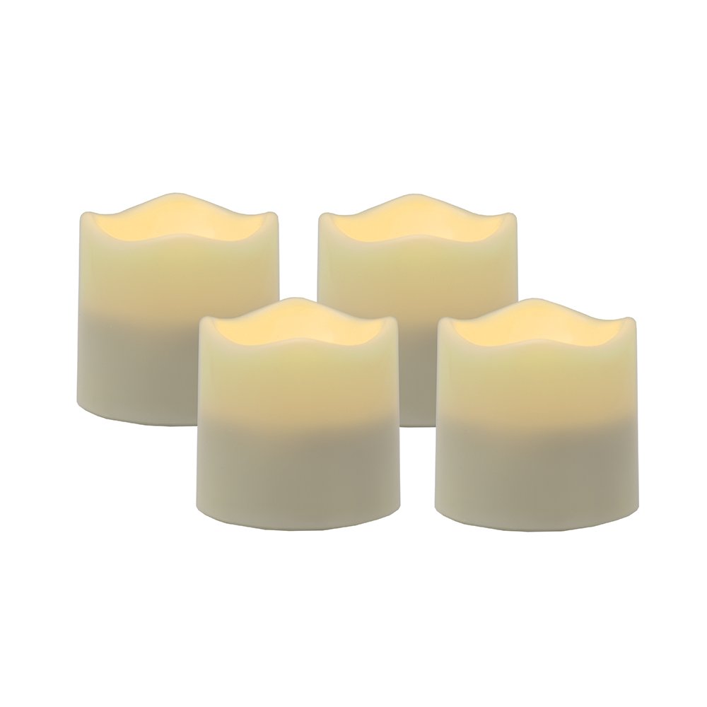 Four ivory flameless tealight candles with a gradient finish on a white background.