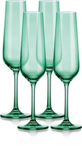 Set of Four Green Crystal Narrowing Shape Stemmed Flute on a white background