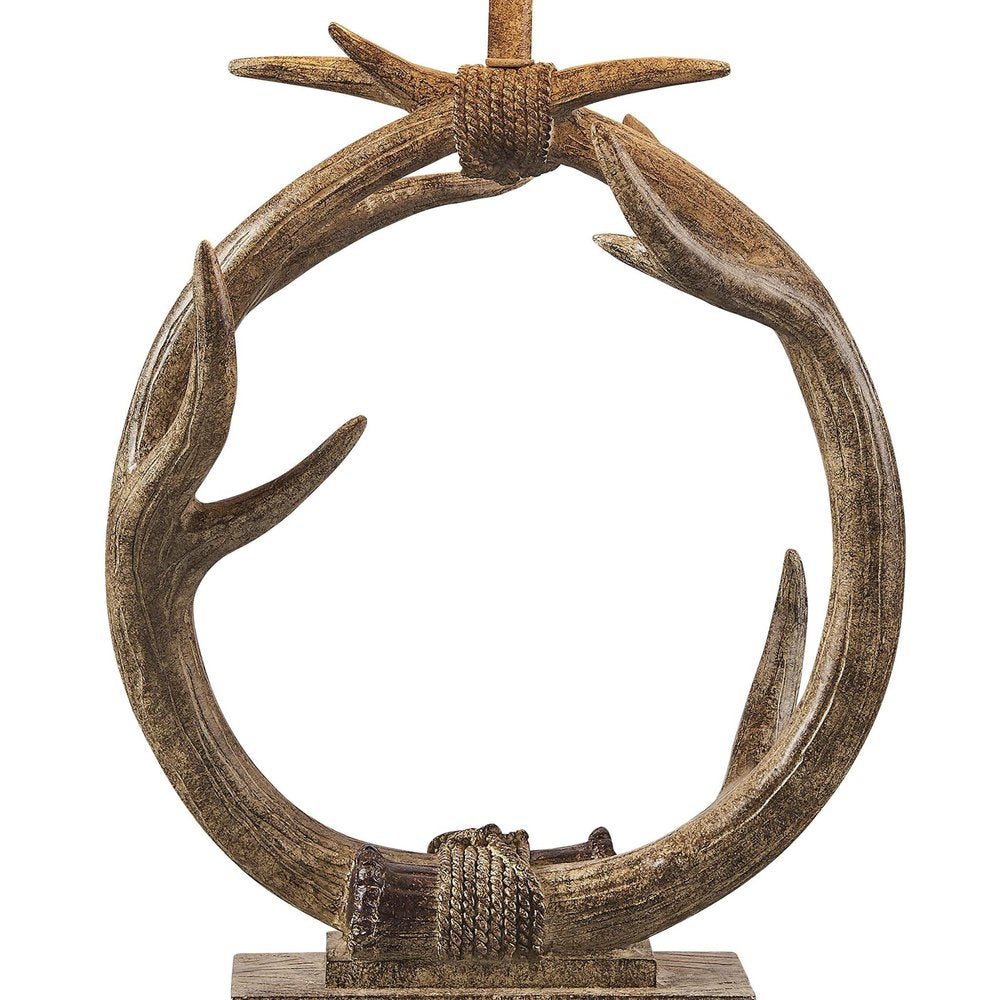 27" Brown Rustic Faux Antlers Table Lamp With White Drum Shade. Table lamp isolated on a plain white background, showing its brown color.