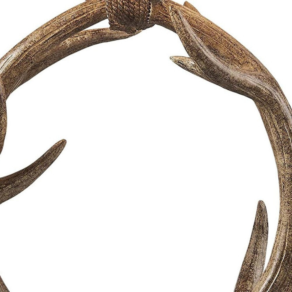 27" Brown Rustic Faux Antlers Table Lamp With White Drum Shade. Table lamp isolated on a plain white background, in a brown finish.