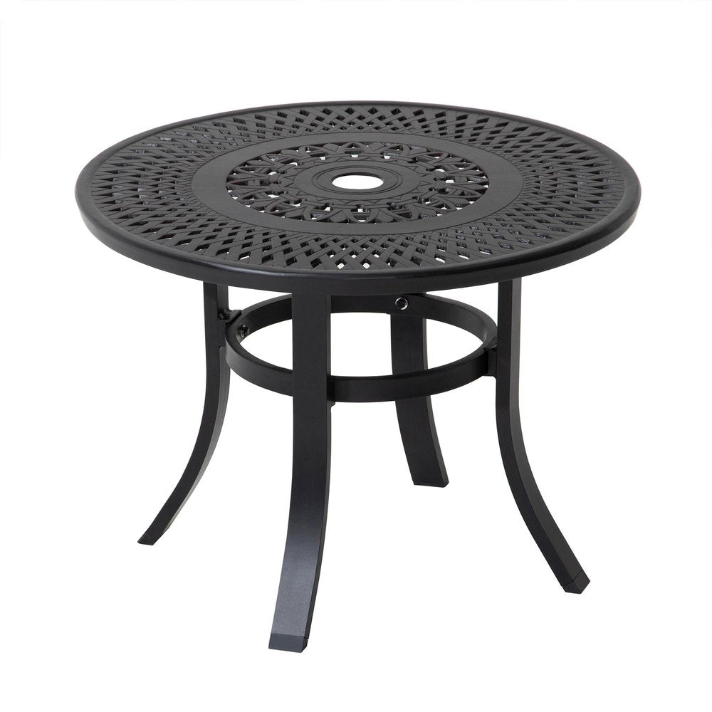 Black round metal outdoor bistro table with ornate lattice top and umbrella hole, on white background.