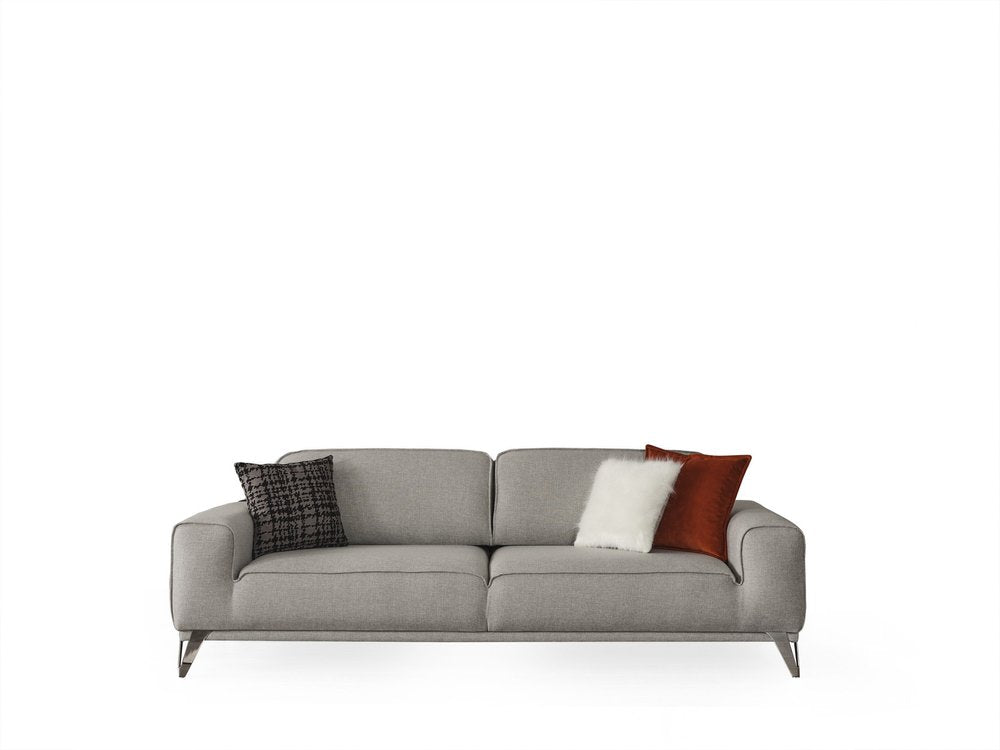 A light gray linen sleeper sofa with three toss pillows on a white background.