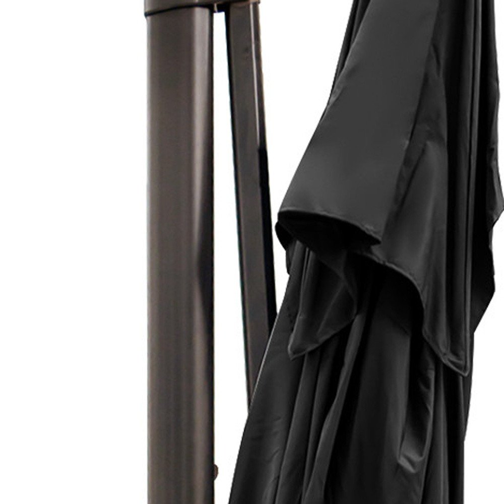 13' Black Polyester Rectangular Tilt Cantilever Patio Umbrella with Stand. Outdoor umbrella isolated on a plain white background, in a black fabric finish.
