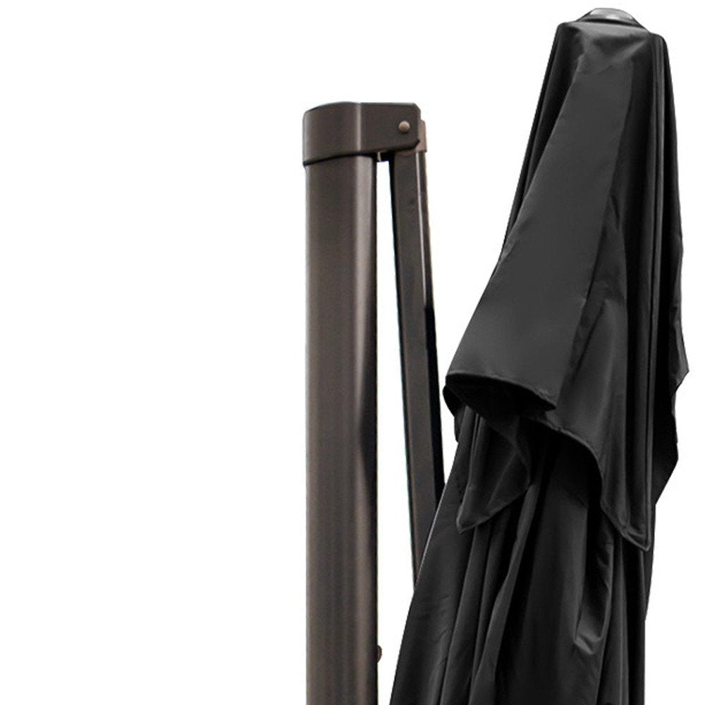 13' Black Polyester Rectangular Tilt Cantilever Patio Umbrella with Stand. Outdoor umbrella isolated on a plain white background, finished in black fabric.