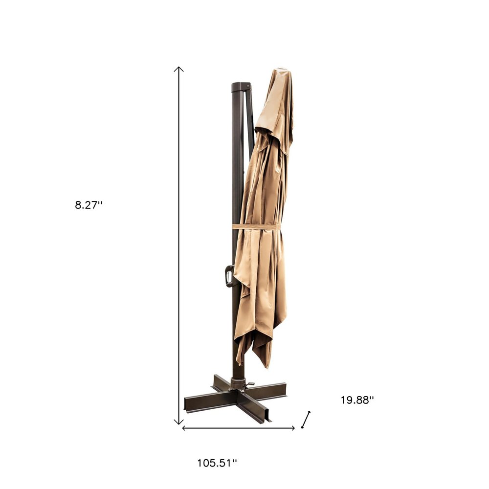 13' Tan Polyester Rectangular Tilt Cantilever Patio Umbrella with Stand. Outdoor umbrella isolated on a plain white background, in a tan fabric finish.
