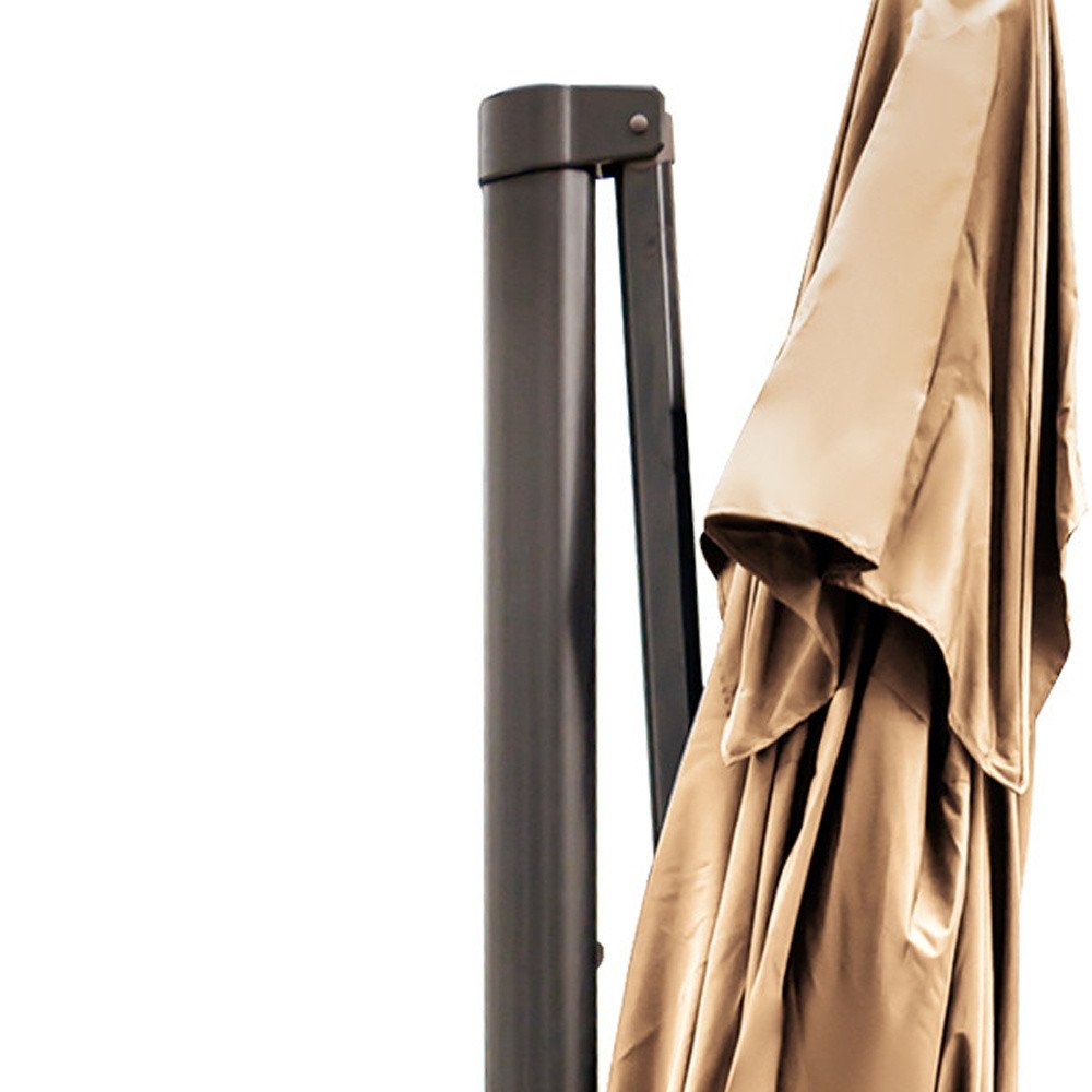 13' Tan Polyester Rectangular Tilt Cantilever Patio Umbrella with Stand. Outdoor umbrella isolated on a plain white background, showing a cream fabric surface.