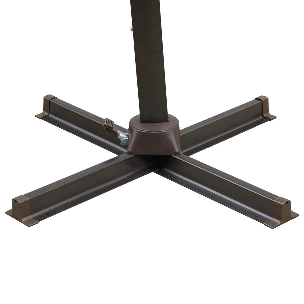 Close-up of a brown metal cantilever umbrella stand with a square base and four extending arms on a white background.